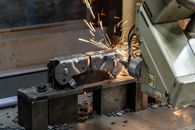 Mitsubishi 3D five-axis laser cutting a formed part at Prototier-1