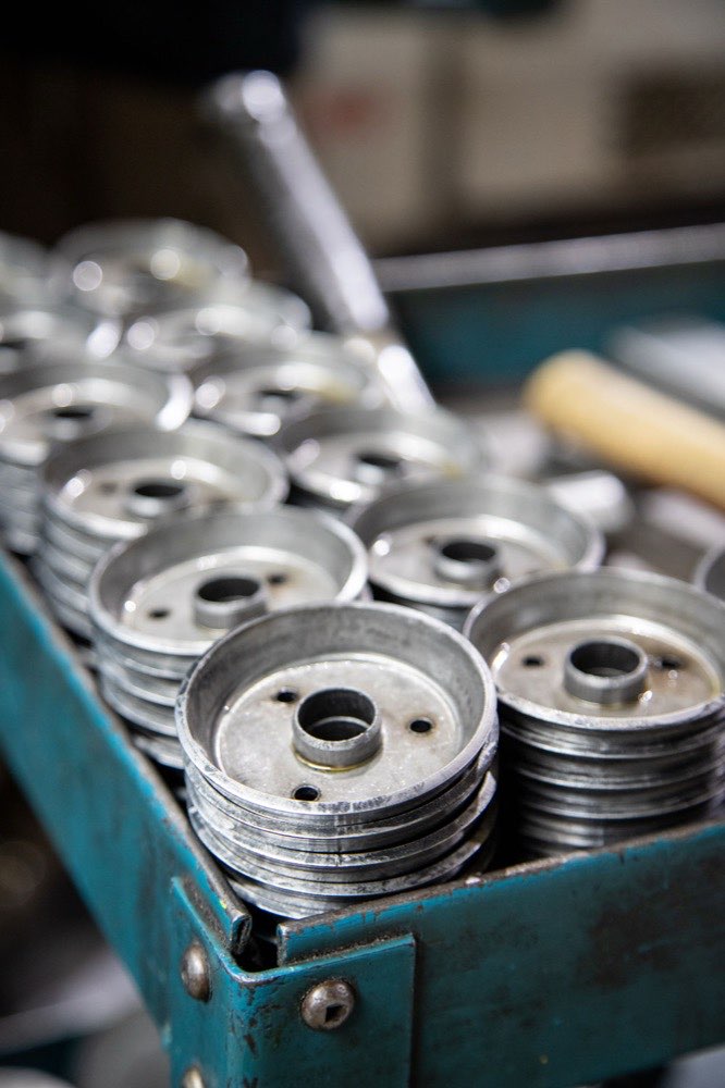 Trays of finished formed metal parts from a Prototier-1 production run